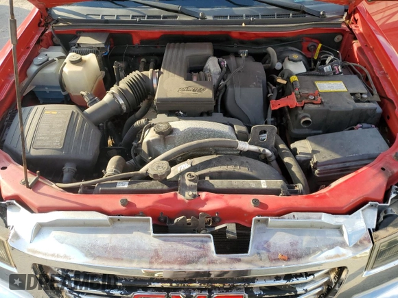 2011 GMC Canyon SLT with VIN 1GTH6NFE5B8130457, listed as a Copart auction lot 72559914 with 0 mi miles and Salvage Title. Bid and sale history available at carsss.com. Image 12.