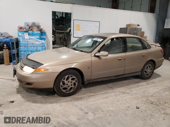 2002 Saturn LS z VIN 1G8JU54F62Y528998, wystawiony jako Copart lot #48390715 z przebiegiem 249 471 mil mil oraz Szkody całkowita. Historia ofert i sprzedaży dostępna na DreamBid. Obrazek 1.