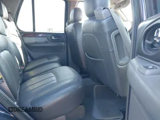 2003 GMC Envoy SLT with VIN 1GKDT13S732268164, listed as a IAAI auction lot 41863800 with 100,702 mi miles. Bid and sale history available at carsss.com. Image 8.
