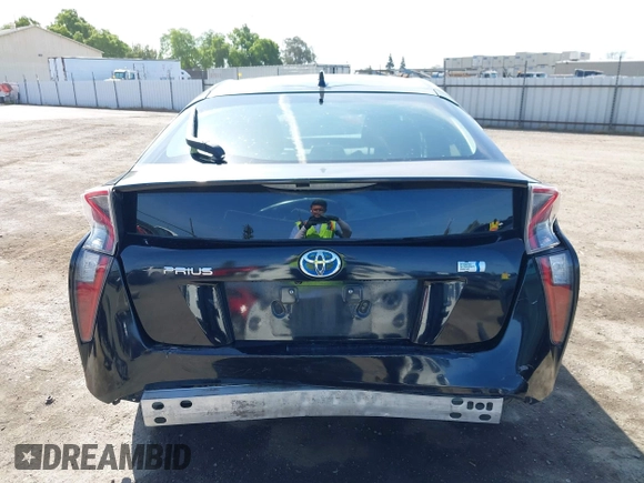 2016 Toyota Prius Two with VIN JTDKBRFU9G3021083, listed as a IAAI auction lot 41986733 with 117,227 mi miles and . Bid and sale history available at DreamBid. Image 17.
