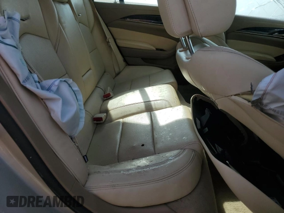2014 Cadillac CTS Luxury AWD с VIN 1G6AX5S34E0180551, выставлен на аукционе Copart как лот 55983015 с пробегом Не указан миль и Списание • Salvage title. История ставок и продаж доступна на DreamBid. Изображение 10.
