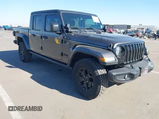 2021 Jeep Gladiator Willys with VIN 1C6HJTAG9ML546644, listed as a IAAI auction lot 41298101 with 40,099 mi miles and . Bid and sale history available at DreamBid. Image 1.