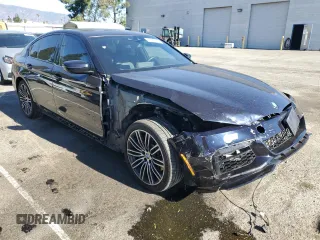 2020 BMW 5 Series 530e with VIN WBAJA9C00LCD60874, listed as a Copart auction lot 87960825 with 91,036 mi miles and Salvage Title. Bid and sale history available at DreamBid. Image 4.
