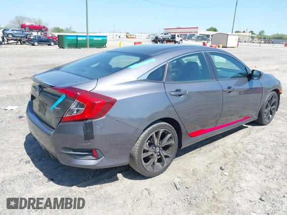 2019 Honda Civic Sport with VIN 2HGFC2F85KH576547, listed as a IAAI auction lot 42024497 with 86,468 mi miles and . Bid and sale history available at DreamBid. Image 4.