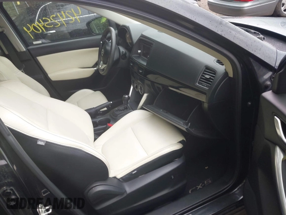 2013 Mazda CX-5 Sport with VIN JM3KE2BE8D0125002, listed as a IAAI auction lot 42425404 with 183,551 mi miles and . Bid and sale history available at DreamBid. Image 5.