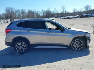 2021 BMW X1 xDrive28i with VIN WBXJG9C06M5S85511, listed as a IAAI auction lot 41705422 with 30,636 mi miles. Bid and sale history available at carsss.com. Image 13.