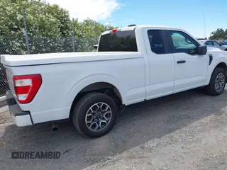 2021 Ford F-150 XL with VIN 1FTEX1CP7MFA52910, listed as a IAAI auction lot 42506488 with 99,607 mi miles and . Bid and sale history available at DreamBid. Image 4.