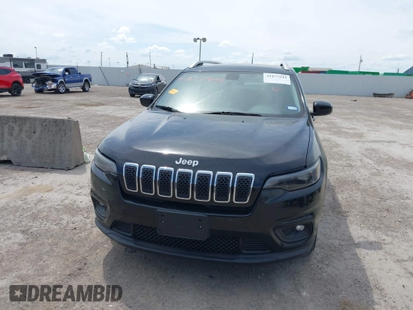 2019 Jeep Cherokee Latitude with VIN 1C4PJLCBXKD284954, listed as a IAAI auction lot 41877944 with 134,931 mi miles. Bid and sale history available at carsss.com. Image 12.