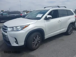 2018 Toyota Highlander SE with VIN 5TDKZRFH7JS546793, listed as a IAAI auction lot 42156937 with 59,181 mi miles and . Bid and sale history available at DreamBid. Image 2.