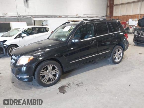 2015 Mercedes-Benz GLK with VIN WDCGG8JB0FG364079, listed as a IAAI auction lot 42096003 with 113,571 mi miles. Bid and sale history available at carsss.com. Image 20.