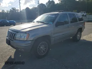 2002 Jeep Grand Cherokee Limited with VIN 1J4GX58S32C149852, listed as a Copart auction lot 71655864 with 190,918 mi miles and Salvage Title. Bid and sale history available at DreamBid. Image 1.