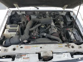 1997 Ford Ranger XLT z VIN 1FTCR10A6VUD38309, wystawiony jako Copart lot #54357705 z przebiegiem 129 777 mil mil oraz Szkody całkowita. Historia ofert i sprzedaży dostępna na DreamBid. Obrazek 11.