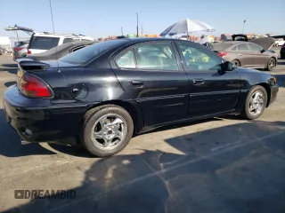 2002 Pontiac Grand Am GT with VIN 1G2NW52E12M704539, listed as a Copart auction lot 73755214 with 100,904 mi miles and Clean Title. Bid and sale history available at carsss.com. Image 3.