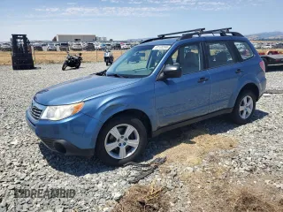2010 Subaru Forester X with VIN JF2SH6BC3AH805703, listed as a Copart auction lot 63100295 with 85,349 mi miles and Salvage title. Bid and sale history available at DreamBid. Image 1.