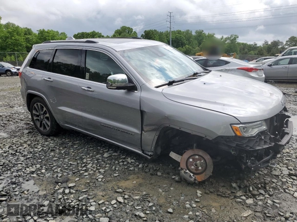 2018 Jeep Grand Cherokee Overland z VIN 1C4RJFCTXJC108624, wystawiony jako Copart lot #53738094 z przebiegiem 83 040 mil mil oraz . Historia ofert i sprzedaży dostępna na DreamBid. Obrazek 4.