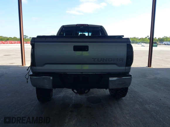 2015 Toyota Tundra Limited with VIN 5TFBW5F14FX424723, listed as a IAAI auction lot 42129929 with 222,060 mi miles and . Bid and sale history available at DreamBid. Image 16.