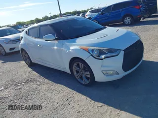 2014 Hyundai Veloster with VIN KMHTC6AD5EU193136, listed as a IAAI auction lot 41836596 with 160,460 mi miles. Bid and sale history available at carsss.com. Image 1.