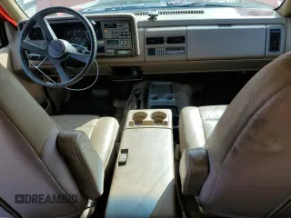 1993 GMC Suburban z VIN 1GKFK16K2PJ718788, wystawiony jako Copart lot #77080724 z przebiegiem 227 320 mil mil oraz Szkoda całkowita • Salvage title. Historia ofert i sprzedaży dostępna na DreamBid. Obrazek 8.