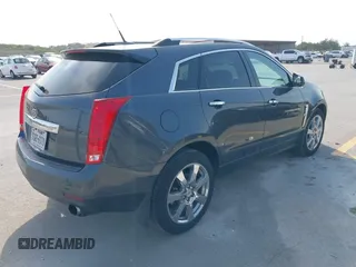 2011 Cadillac SRX Premium Collection with VIN 3GYFNFEY9BS601541, listed as a IAAI auction lot 41950409 with 168,358 mi miles. Bid and sale history available at carsss.com. Image 4.
