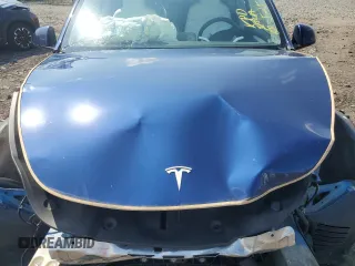 2024 Tesla Model Y Long Range with VIN 7SAYGAEEXRF983702, listed as a Copart auction lot 61536565 with Not provided miles and Salvage title. Bid and sale history available at DreamBid. Image 12.