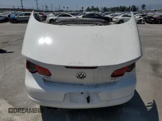 2009 Volkswagen Eos Komfort с VIN WVWBA71F49V023797, выставлен на аукционе Copart как лот 58764645 с пробегом Не указан миль и На запчасти • Non repairable. История ставок и продаж доступна на DreamBid. Изображение 6.
