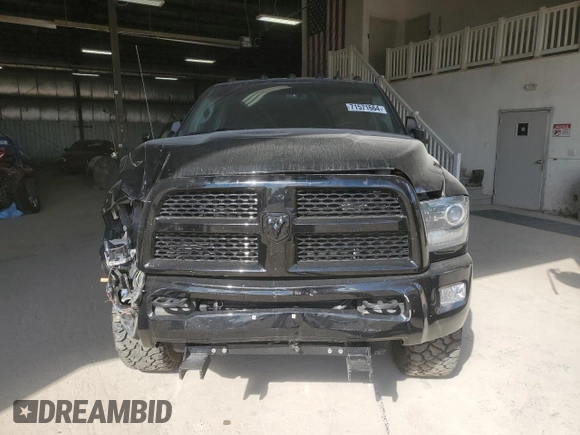 2014 Ram 3500 Laramie with VIN 3C63R3JL9EG258069, listed as a Copart auction lot 71571664 with 104,983 mi miles and Salvage Title. Bid and sale history available at carsss.com. Image 5.