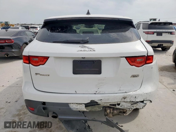 2020 Jaguar F-Pace 25t Premium with VIN SADCJ2FX1LA628811, listed as a Copart auction lot 52979165 with 60,831 mi miles and Salvage title. Bid and sale history available at DreamBid. Image 6.