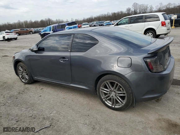 2011 Scion tC with VIN JTKJF5C71B3017022, listed as a Copart auction lot 52859865 with 220,603 mi miles and Salvage Title. Bid and sale history available at carsss.com. Image 2.