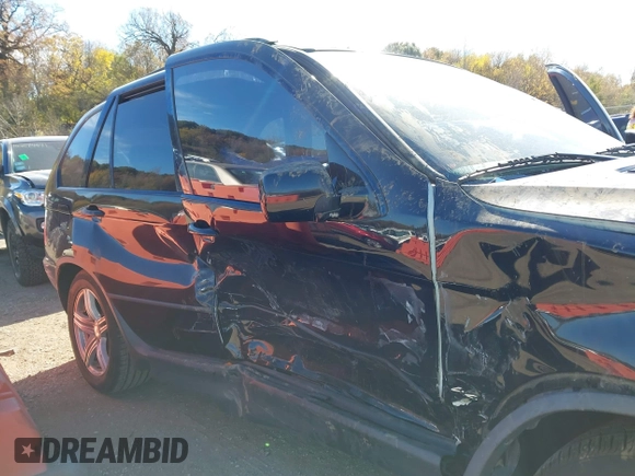 2001 BMW X5 4.4i with VIN WBAFB33581LH08039, listed as a IAAI auction lot 40679627 with 1 mi miles. Bid and sale history available at carsss.com. Image 6.