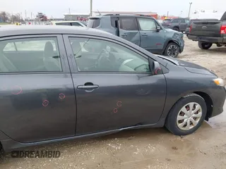 2009 Toyota Corolla with VIN 1NXBU40E99Z138136, listed as a IAAI auction lot 41967052 with 207,892 mi miles. Bid and sale history available at carsss.com. Image 17.
