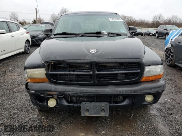 2001 Dodge Dakota Sport z VIN 1B7GL22N31S137577, wystawiony jako Copart lot #50119405 z przebiegiem Nie podano mil oraz Czysty tytuł • Clean title. Historia ofert i sprzedaży dostępna na DreamBid. Obrazek 5.