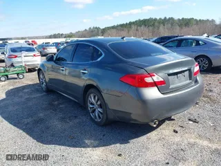 2013 Infiniti M37 with VIN JN1BY1AP0DM510398, listed as a IAAI auction lot 41621916 with 139,002 mi miles. Bid and sale history available at carsss.com. Image 3.