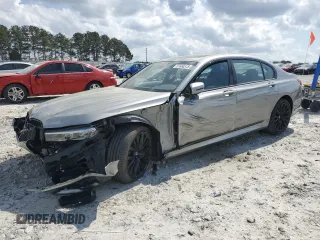 2022 BMW 7 Series 740i with VIN WBA7T2C09NCJ48292, listed as a Copart auction lot 51650315 with 21,585 mi miles and Salvage Title. Bid and sale history available at carsss.com. Image 1.