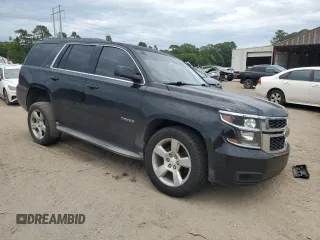 2015 Chevrolet Tahoe LS with VIN 1GNSCAKC5FR308614, listed as a Copart auction lot 60138355 with 145,797 mi miles and Salvage title. Bid and sale history available at DreamBid. Image 4.