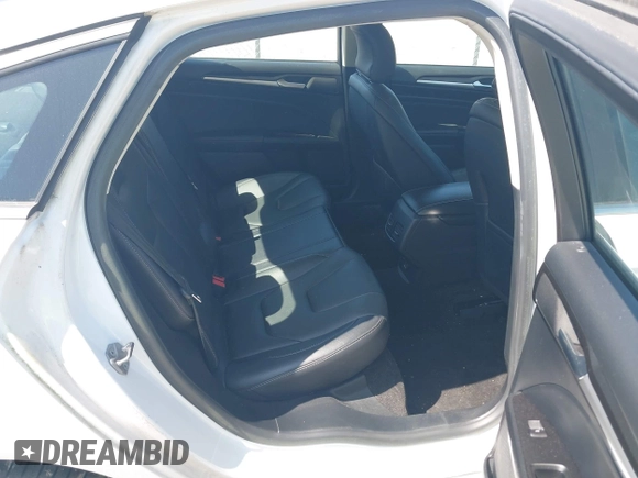 2018 Ford Fusion Titanium with VIN 3FA6P0D98JR134230, listed as a IAAI auction lot 42567084 with 107,459 mi miles and . Bid and sale history available at DreamBid. Image 8.