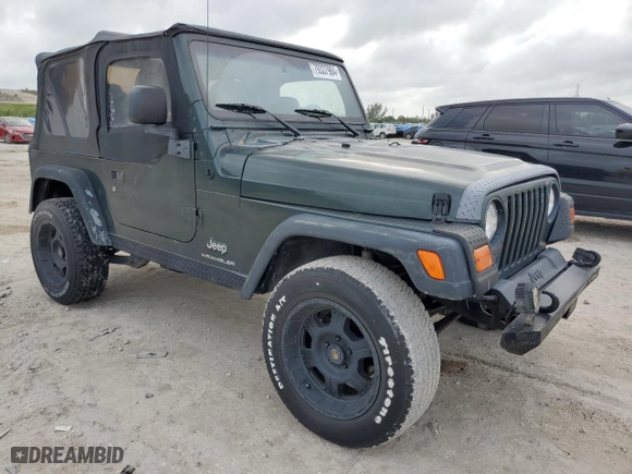 2003 Jeep Wrangler SE with VIN 1J4FA29103P313229, listed as a Copart auction lot 79337984 with 135,668 mi miles and Salvage Title. Bid and sale history available at carsss.com. Image 4.