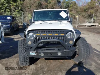 2014 Jeep Wrangler Sport with VIN 1C4AJWAG0EL245337, listed as a IAAI auction lot 41532314 with 140,721 mi miles and . Bid and sale history available at DreamBid. Image 12.