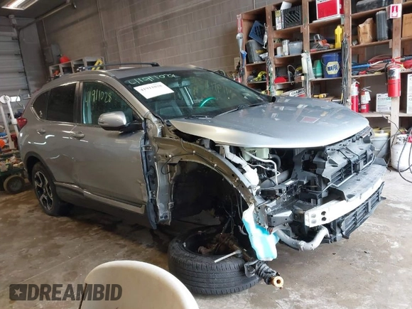 2017 Honda CR-V Touring with VIN 5J6RW2H95HL042012, listed as a IAAI auction lot 41911028 with 93,575 mi miles. Bid and sale history available at carsss.com. Image 1.
