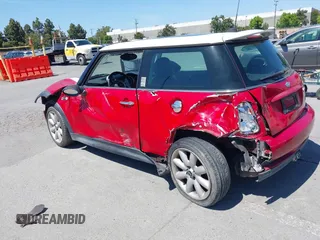2005 MINI Hardtop S with VIN WMWRE33515TG96312, listed as a IAAI auction lot 42397054 with 176,049 mi miles and . Bid and sale history available at DreamBid. Image 3.