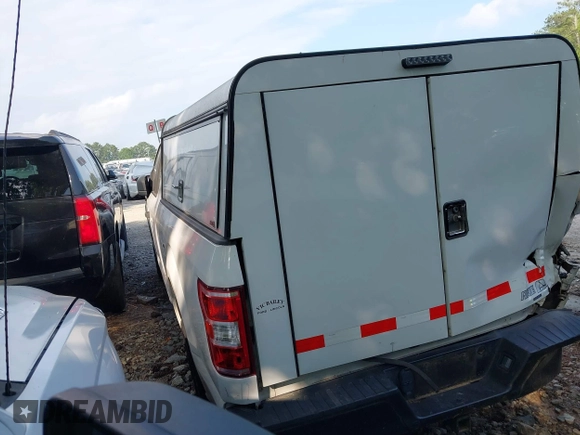 2020 Ford F-150 XL with VIN 1FTEX1CP7LKD41159, listed as a IAAI auction lot 42318766 with 144,173 mi miles and . Bid and sale history available at DreamBid. Image 3.