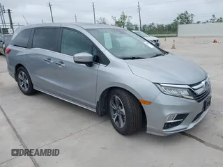 2019 Honda Odyssey Touring with VIN 5FNRL6H89KB045003, listed as a IAAI auction lot 41965310 with 69,043 mi miles. Bid and sale history available at carsss.com. Image 1.