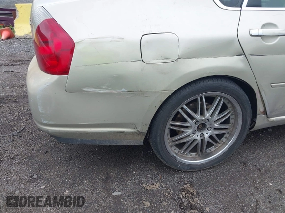 2006 Infiniti M Sport z VIN JNKBY01E06M207564, wystawiony jako IAAI lot #42384952 z przebiegiem 189 804 mil mil oraz . Historia ofert i sprzedaży dostępna na DreamBid. Obrazek 14.