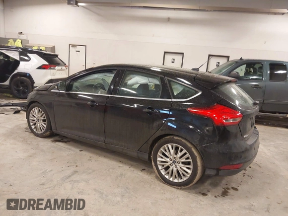 2017 Ford Focus Titanium with VIN 1FADP3N25HL222297, listed as a IAAI auction lot 41698707 with 121,756 mi miles and . Bid and sale history available at carsss.com. Image 3.