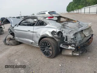 2020 Ford Mustang GT with VIN 1FA6P8CF8L5174979, listed as a IAAI auction lot 41798920 with 59,558 mi miles and . Bid and sale history available at DreamBid. Image 3.