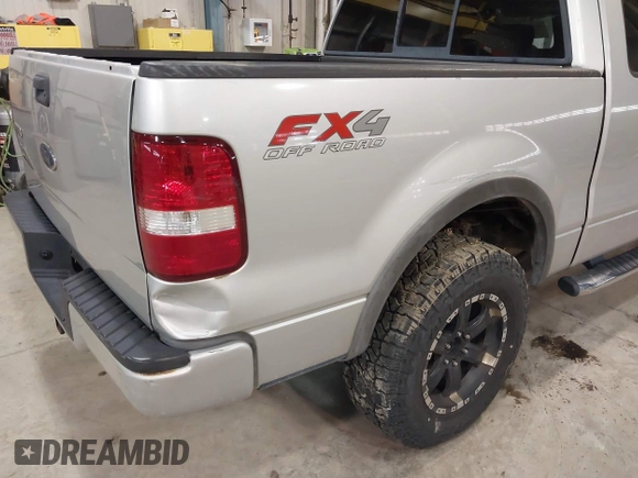2005 Ford F-150 XLT with VIN 1FTPX14555FA52671, listed as a IAAI auction lot 41733466 with 214,826 mi miles. Bid and sale history available at carsss.com. Image 6.