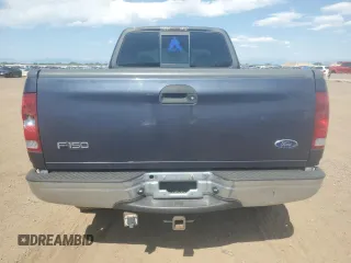2001 Ford F-150 XL with VIN 1FTRX18L71NA27627, listed as a Copart auction lot 64190715 with 105,503 mi miles and Salvage title. Bid and sale history available at DreamBid. Image 6.