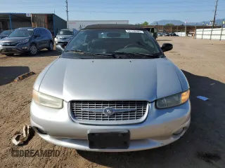 2000 Chrysler Sebring JXi z VIN 3C3EL55H6YT245753, wystawiony jako Copart lot #58146525 z przebiegiem 102 605 mil mil oraz Tytuł czysty. Historia ofert i sprzedaży dostępna na DreamBid. Obrazek 5.