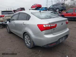 2015 Kia Rio LX with VIN KNADM4A39F6452036, listed as a IAAI auction lot 41516879 with 95,775 mi miles. Bid and sale history available at carsss.com. Image 3.