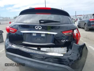 2014 Infiniti QX70 z VIN JN8CS1MW6EM410091, wystawiony jako IAAI lot #41896327 z przebiegiem 139 021 mil mil oraz . Historia ofert i sprzedaży dostępna na DreamBid. Obrazek 16.