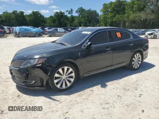 2013 Lincoln MKS EcoBoost with VIN 1LNHL9FT6DG613572, listed as a Copart auction lot 53317005 with 149,411 mi miles and Salvage title. Bid and sale history available at DreamBid. Image 1.